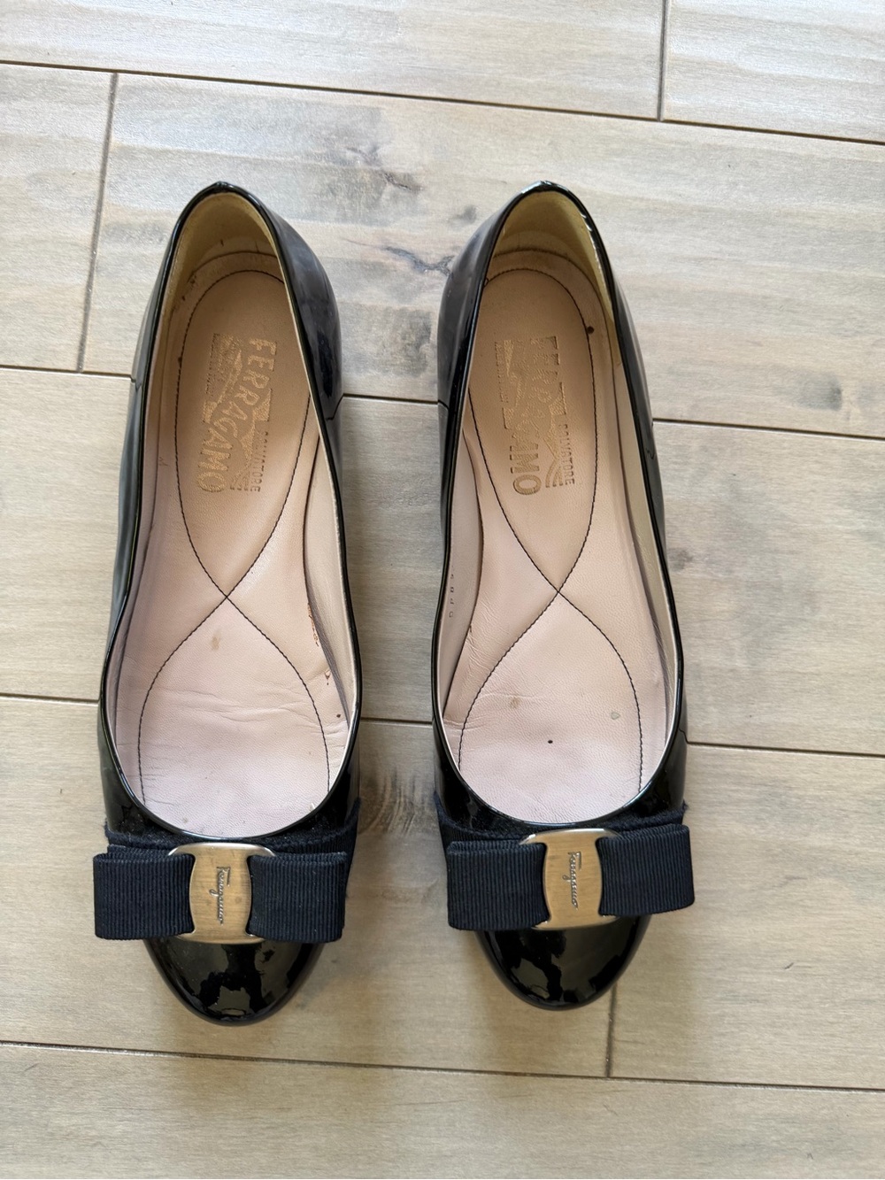 Salvatore Ferragamo Black Patent Leather Bow Flats with Gold Plaque, size 7